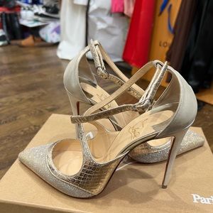 CHRISTIAN LOUBOUTIN Crissos 100 gold cross strap silver glitter pump EU37.5